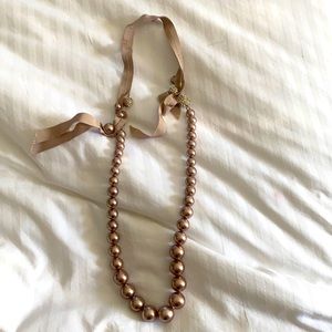 Beige pearl long necklace